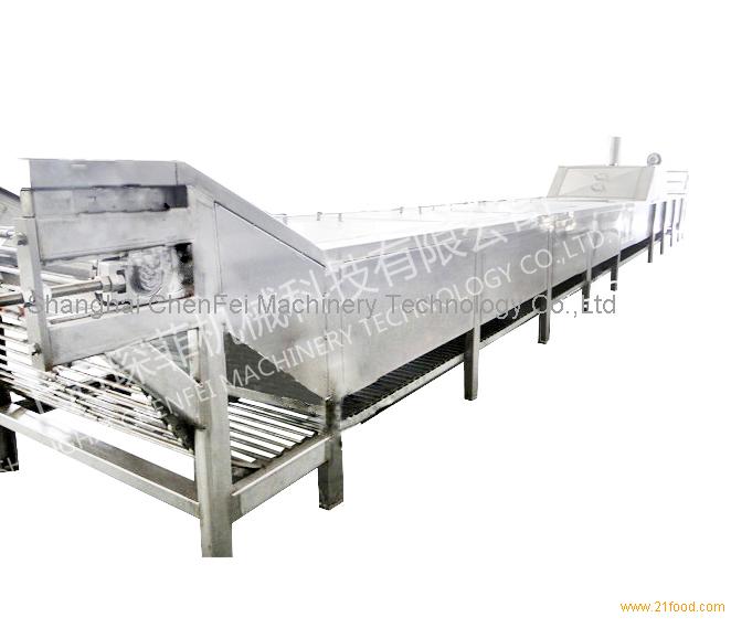 Continuous cooking machine