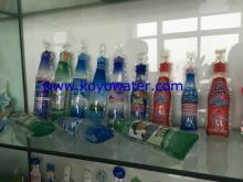Bottle shaped pouch filing packing machine
