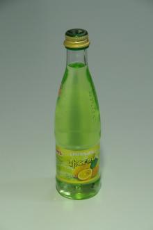 Lemon Carbonated Soft Drink in Glass Bottle