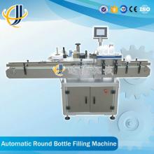 Salad dressing bottle labeling machine