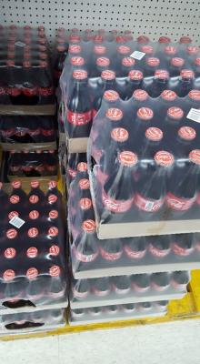 coca cola bottle on the floor