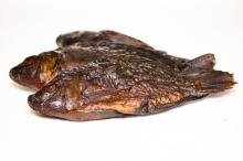 salted smooked tilapia in market