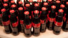 Coca Classic 330ml products/drinks in cans Cola all text on sale