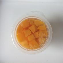 canned fruit cocktail in plastic cups