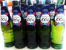 KRONENBOURG BLANC 1664 BEER BOTTLE AND CANS