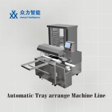Automatic tray arranging machine