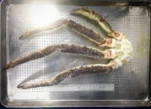 Raw frozen red king crab legs